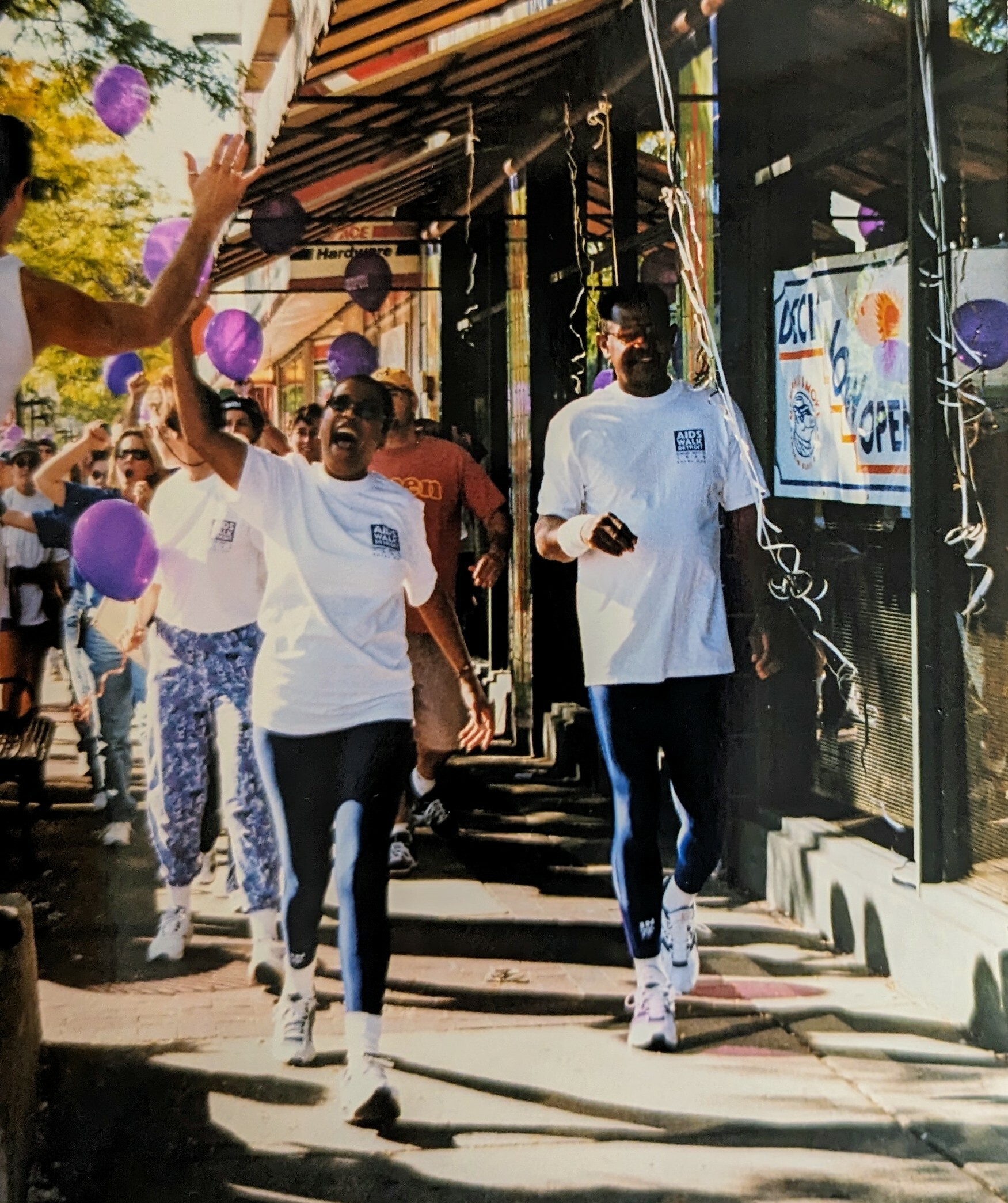 Former WXYZ anchor Diana Lewis and her cousin led off AIDS Walk Detroit in 1999. Here, they are walking through the streets of downtown Royal Oak. Photo: Jason A. Michael