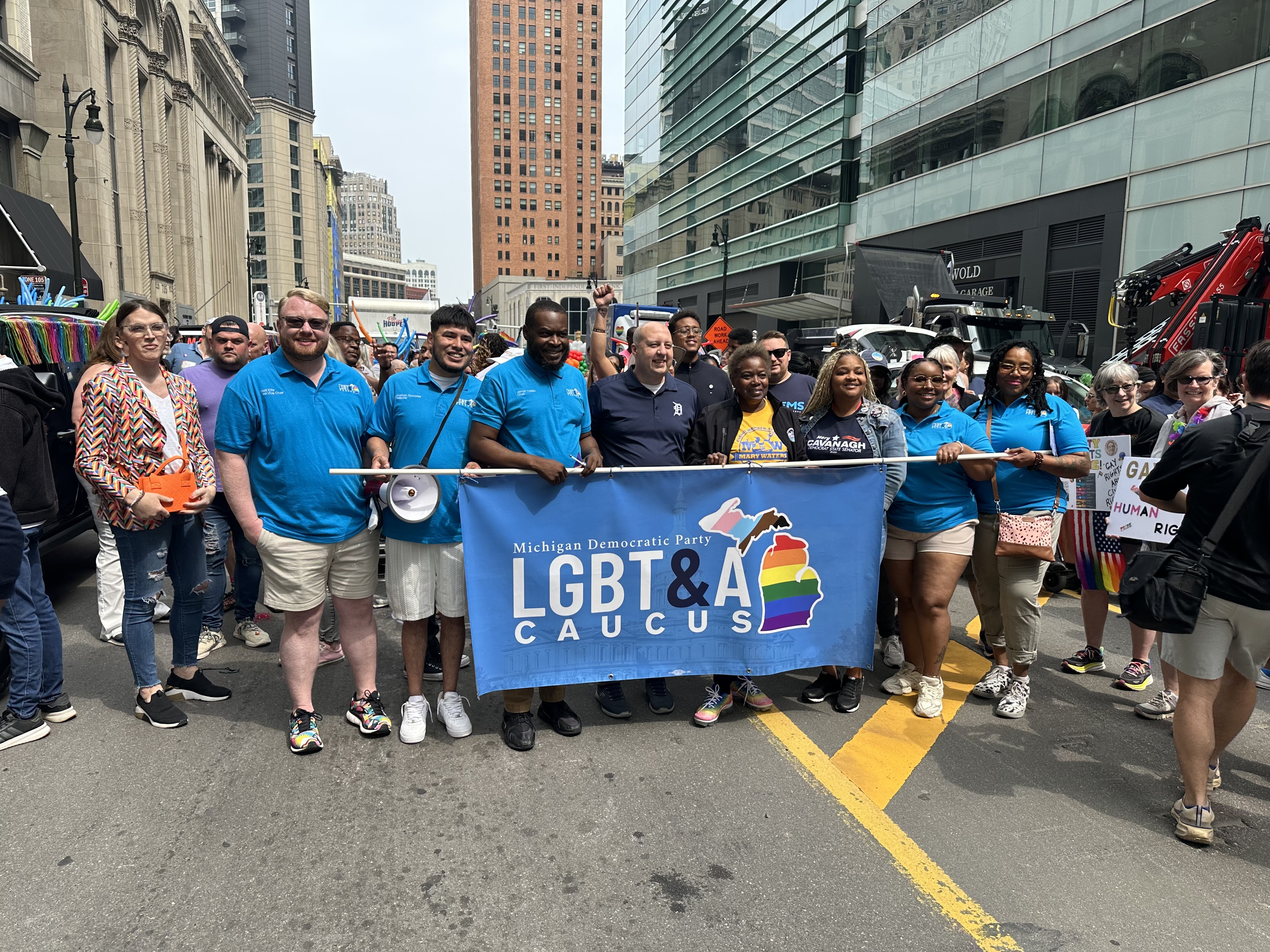 Jerron Totten (center left) and the Michigan LGBT&A Caucus at Motor City Pride in 2025. Courtesy photo