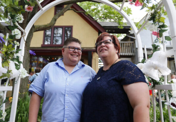 'We don't want to go back to being second-class citizens,' said April DeBoer, seen here with wife Jayne Rowse in 2015 following a ruling by the US Supreme Court that struck down same-sex marriage bans nationwide. Photo via Bridge Michigan Republishing License: Paul Sancya/Associated Press