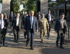 President Donald Trump with a group of officials and advisors walking from the White House to St. John's Church, following the forced removal of protesters at Lafayette Square in 2020. Photo: Public Domain, Wikimedia Commons