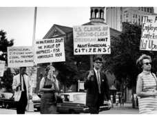 Pioneering LGBTQ+ activist Kay Lahusen, right, and other demonstrators carry signs in front of Independence Hall in Philadelphia on July 4, 1967. Public domain image