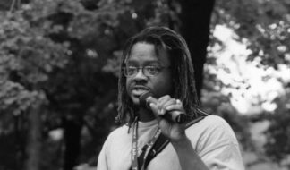 Johnny Jenkins speaking at a Hotter Than July event in Palmer Park. Courtesy photo