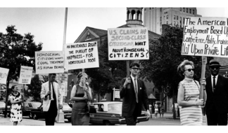 Pioneering LGBTQ+ activist Kay Lahusen, right, and other demonstrators carry signs in front of Independence Hall in Philadelphia on July 4, 1967. Public domain image