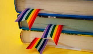 Bigstock A Stack Of Three Books With Ra 319540543