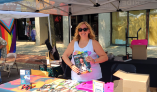 Pride Source Operations Manager Carolyn Cardenas at Ann Arbor Pride 2025. Photo: Anni Arbour