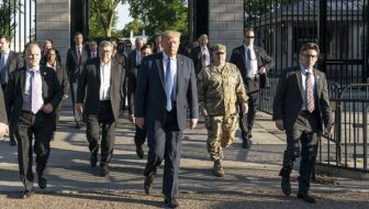 President Donald Trump with a group of officials and advisors walking from the White House to St. John's Church, following the forced removal of protesters at Lafayette Square in 2020. Photo: Public Domain, Wikimedia Commons