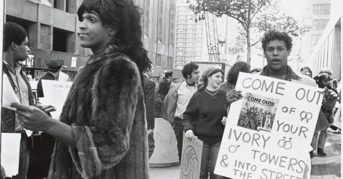 Marsha P. Johnson hands out flyers for support of gay students at N.Y.U. in 1970. Photo: New York Public Library/Diana Davies