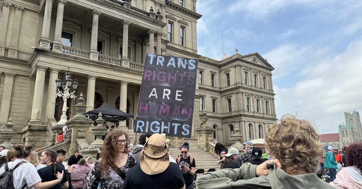 Michiganders gather on the lawn of the Capitol Building in Lansing on March 30, 2025 to celebrate International Transgender…