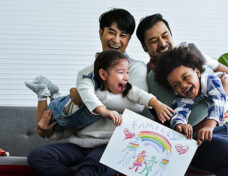 Male gay taking care adopted children who are happy diverse litt