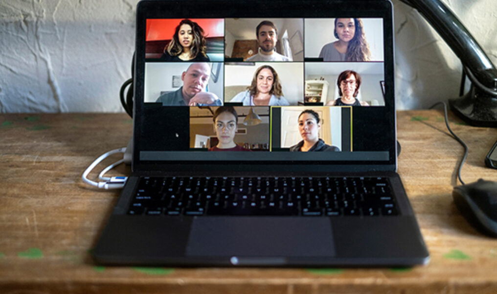 Shot Of A Screen Of Teammates Doing A Virtual Conference From Th