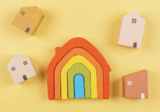 bigstock-Rainbow-Flag-Colors-Toy-House-423437048-scaled