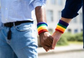 Gay Couple Holding Hands. Lgbtq Flag. Lgbt Life