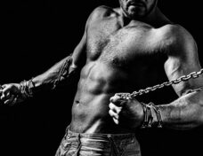 Man With Broken Chains, Holding Chain. Fitness Abdominal Muscle.