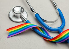 Stethoscope and LGBT rainbow ribbon pride symbol. Medical suppor