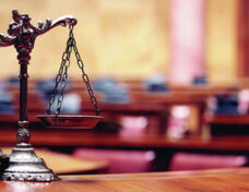 scales_of_justice_3_insert_by_Bigstock