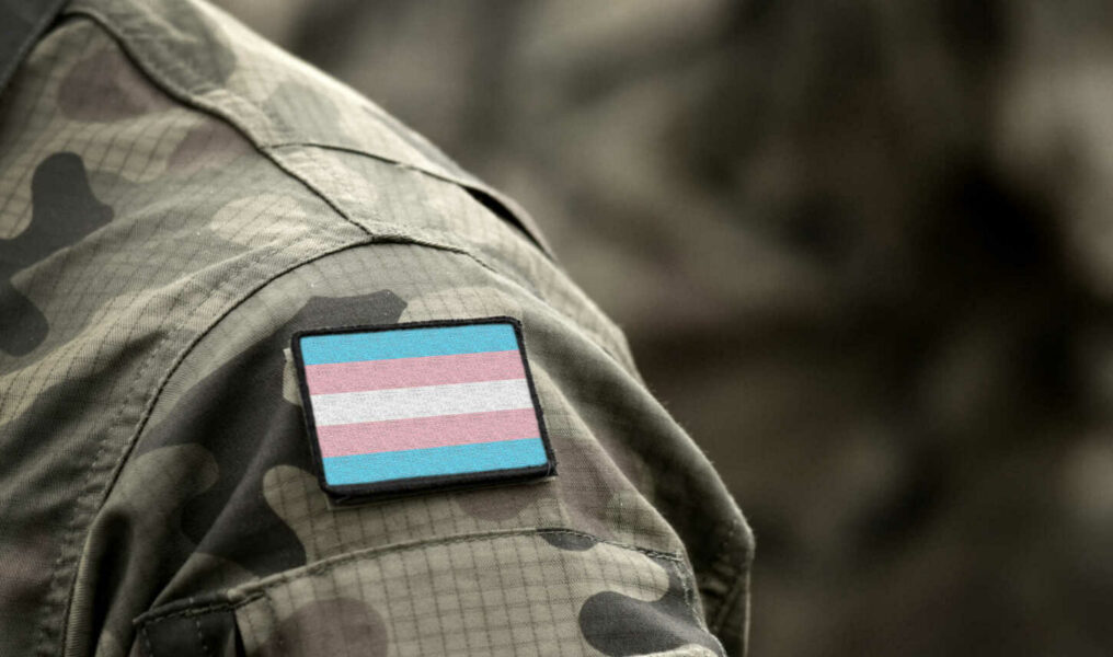 Transgender Pride Flag on military uniform. Integration, Discrim