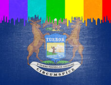 Paint (rainbow flag) is dripping over the state flag of Michigan