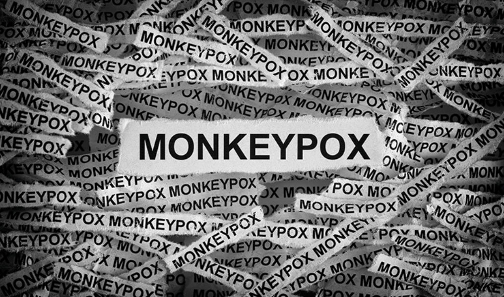 Strips Of Newspaper With The Word Monkeypox Typed On Them. Monke
